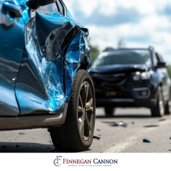 After a Rockville, MD car accident, a heavily damaged car sits in the road surrounded by debris